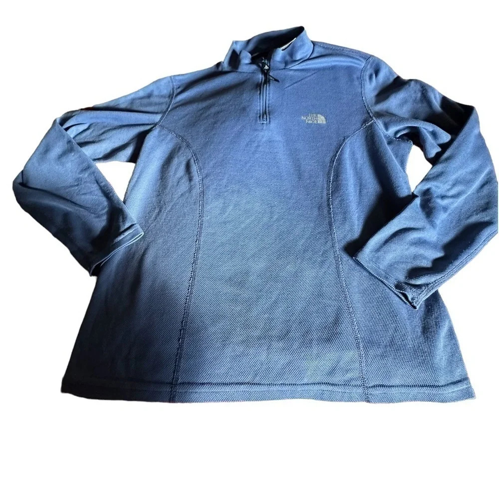 North face size large 3/4 zip base layer. Periwinkle‎ blue . Gently used.
